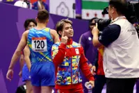 Games-Asian Games redemption sweet for Philippines gymnast Yulo