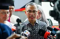 Cabinet committed to political stability, governing until term ends, says Fahmi