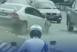 QuickCheck: Was a car caught on video climbing a divider to drive against traffic in Ipoh?