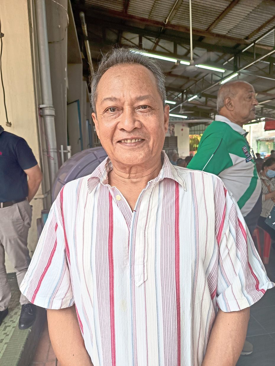 Danial says it is common for cars and motorcycles to be parked along the road for days.
