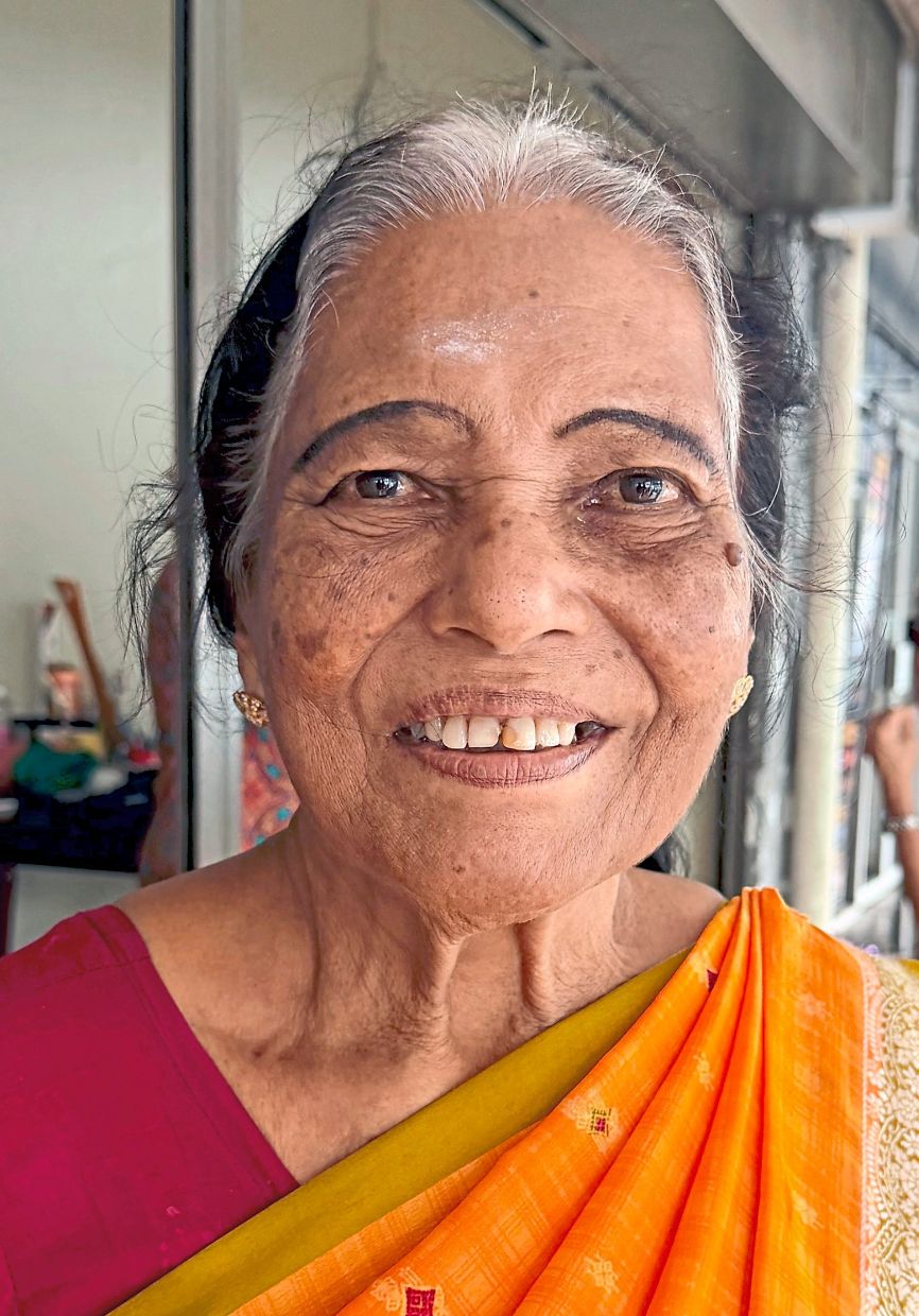 Janakee routinely saves recyclables at home.