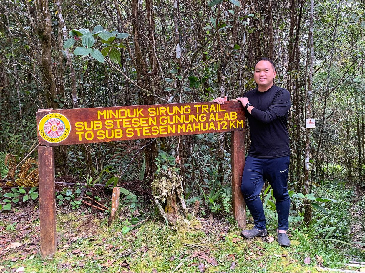 Assoc. Prof. Dr. Evan S.H. Quah conducting fieldwork at Gunung Alab, Sabah.