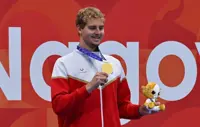 Swimming-Frustrated with France, Arkhelangskiy savours Asian Games gold for adopted Bahrain