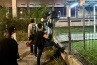 QuickCheck: Did passengers have to climb the fence after a train station failed to open on time?