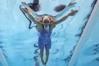Olympics-South Africa's most decorated Olympian is back in the pool