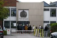Founder of UK anti-migrant group denies criminal damage by slashing small boat