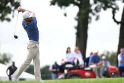 Golf-US edges International team in tight Presidents Cup opener