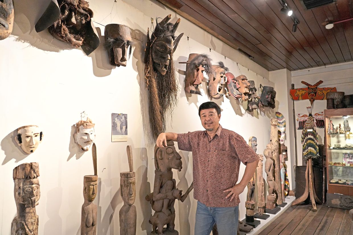 Yiu with his antiques at Art House Gallery Museum of Ethnic Arts.