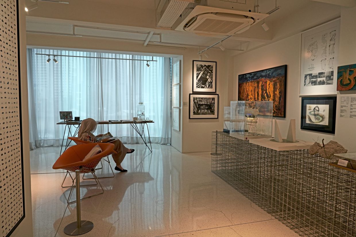 A visitor relaxing while taking in one of the curated themed exhibitions at Ur-Mu Bukit Bintang.