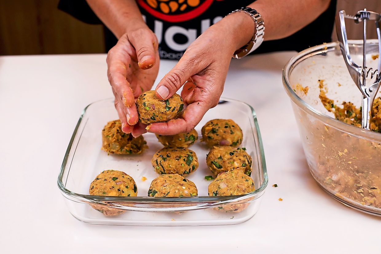 Use your hands to shape the cutlets into a flattened ball.