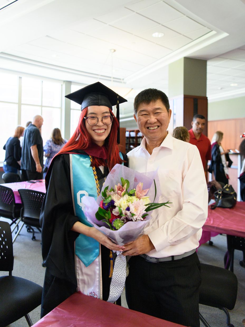 Siew (left) recalls watching the late-night news with her father, a full-circle moment in her journalism career. Photo: Amanda Siew