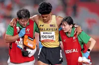 Medal hopeful Azeem suffers injury as Puripol races to 100m gold with Games record