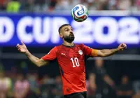 Soccer-Egypt's Salah ruled out of South Sudan qualifier due to artificial surface