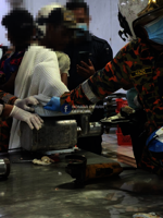 Orang Asli worker's hand trapped in meat grinder at chicken processing factory