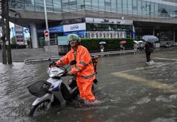 All 50 Bangkok districts declared disaster zones as flooding worsens; canals full and roads submerged