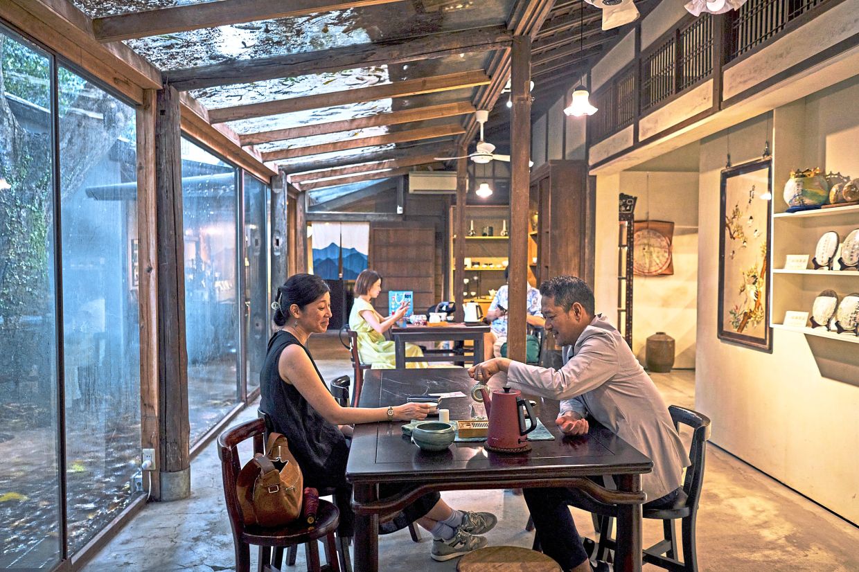 Patrons at Qingtian Tea House, a charming oasis that occupies a Japanese-era wooden home in Taipei. Photo: The New York Times/An Rong Xu