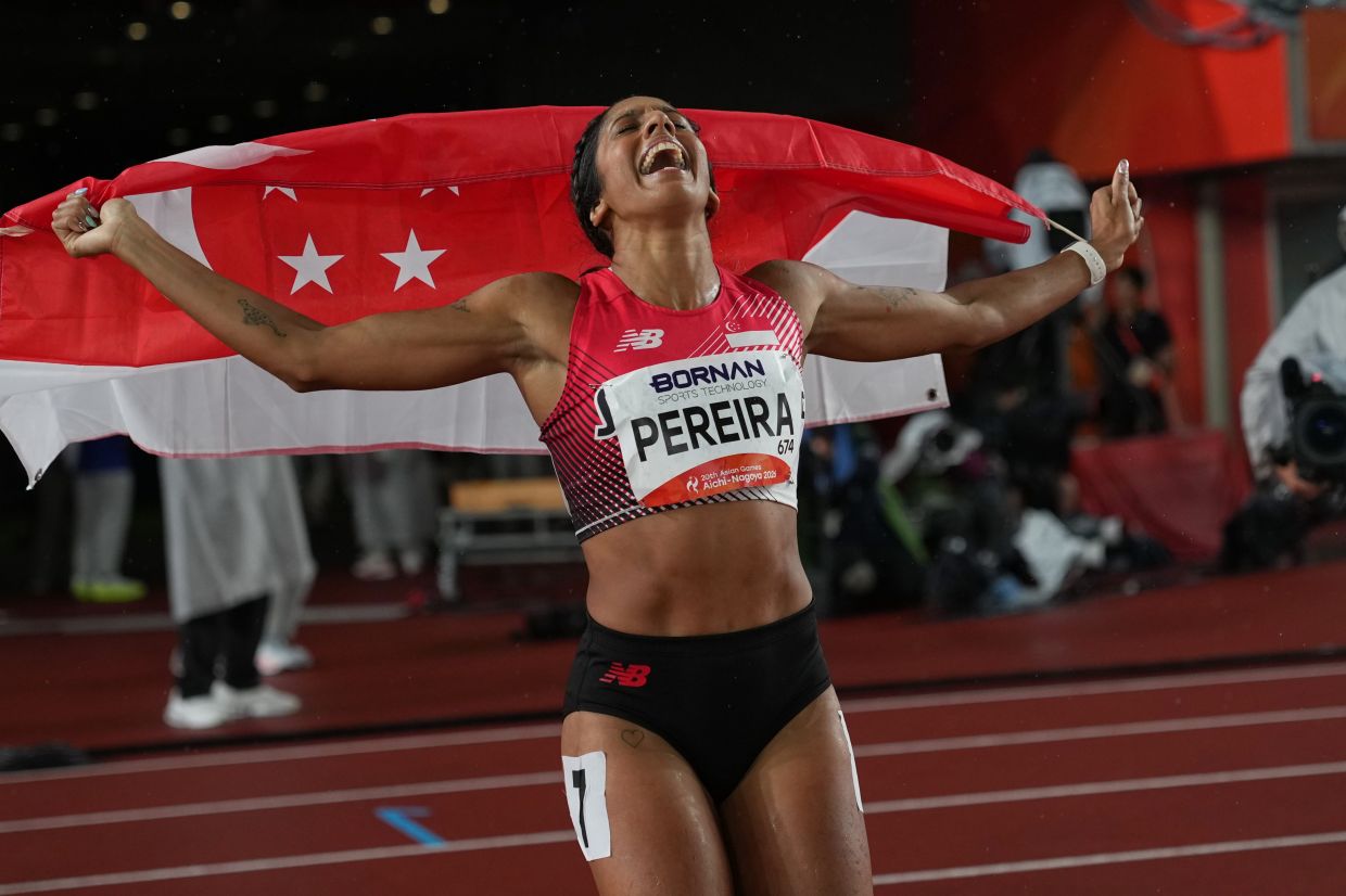 Singapore's Shanti Pereira celebrates after wining the women's 200m final at the Asian Games in Nagoya, Japan, Sunday, on Sunday, Sept. 27, 2026. -- AP Photo/Lee Jin-man