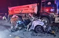 Four killed after car crashes into parked trailer in KK