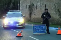 UK police arrest 5 by air base under terrorism act