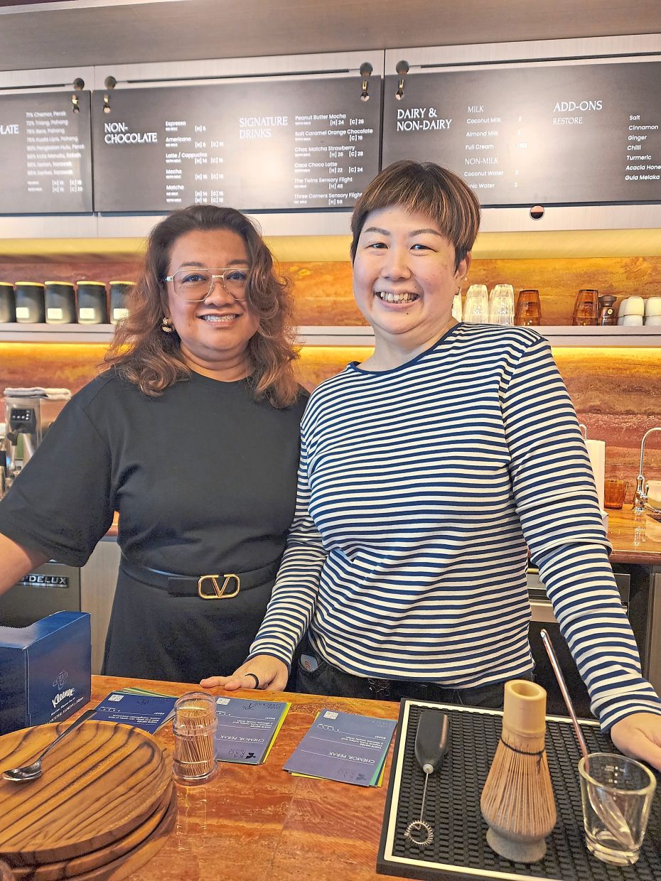 Sasya (left) and Khoo opened Kakao Origin because they had seen chocolate drink bars overseas and realised there was a gap in the Malaysian market to open something similar. — Photo: ABIRAMI DURAI/The Star