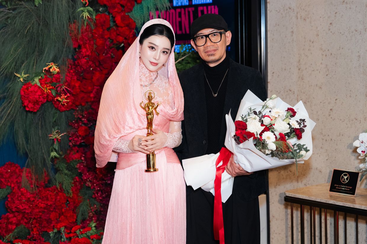 Malaysian filmmaker Chong Keat Aun and Chinese actress Fan Bingbing at the Bangkok Film Festival. 