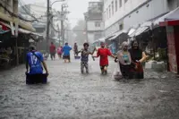 Thousands huddle in Bangkok shelters as Thai flood damages seen at $320 million