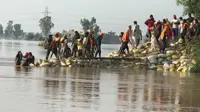 Heavy rain and flooding kill at least 62 in northern India