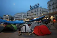 Protesters demand Spanish government limit evictions after pensioner forced out