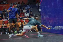Ng makes quick return to lead M'sia into team quarters a day after singles success