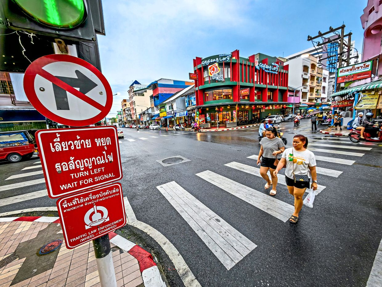 Clear zebra crossings and road signs improve safety for pedestrians and motorists in Hat Yai.