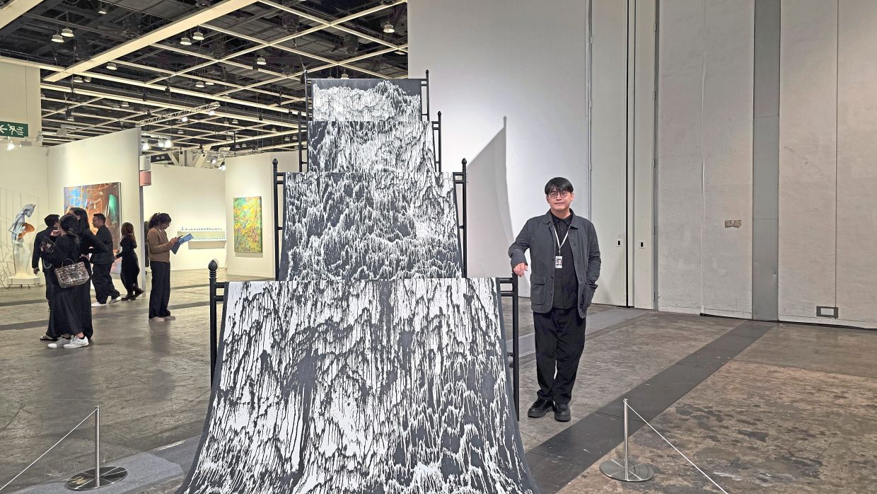 Yeoh with his installation piece 'Streaming Mountain' (2018-2026), which was featured at Art Basel Hong Kong this year. — HANIS MAKETAB/The Star