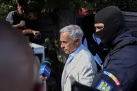 Romanian court rules to detain pro-Russian former presidential candidate pending fraud probe
