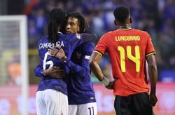 Soccer-France snatch late winner in Belgium, Italy thrash Turkey 4-1 away