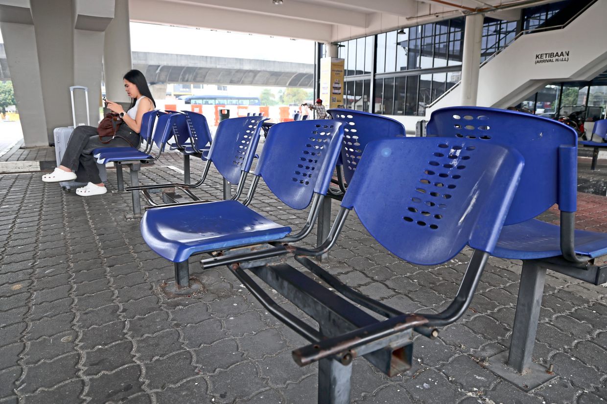 Broken seats at the waiting area in the Sungai Nibong Bus Terminal.