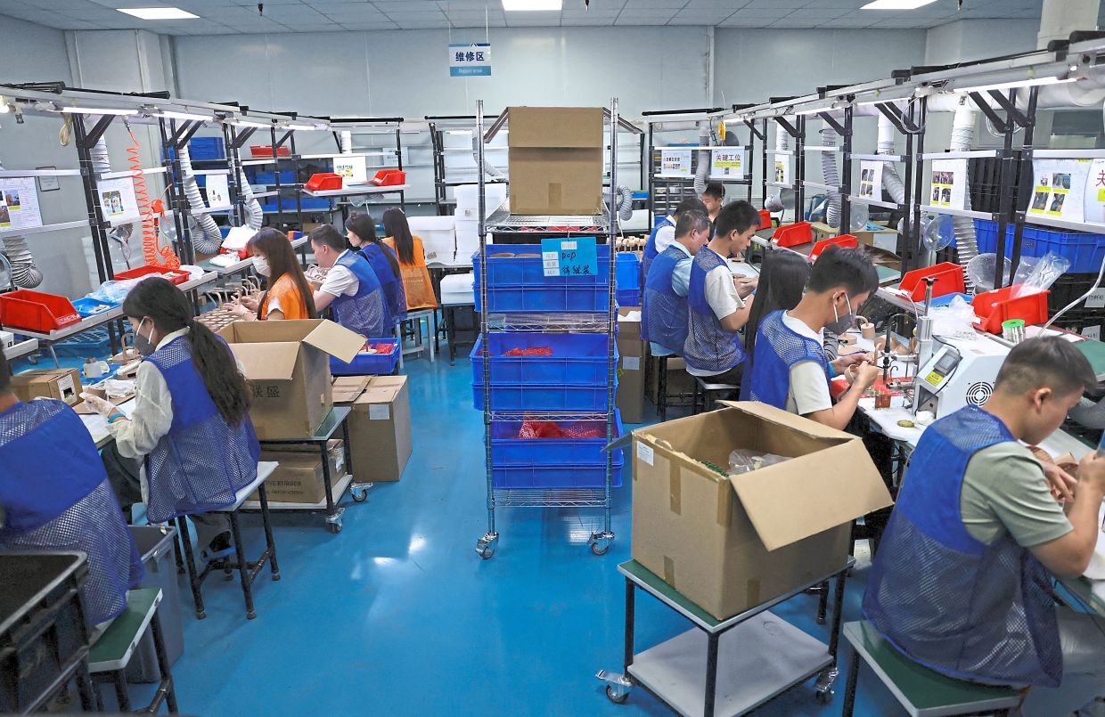 China Factory Activity Returns to Growth in September as AI Demand Rises