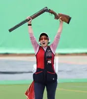 India trap shooting coach Wilson keeps his clothes on despite pledge