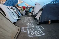 Protesters camped out across Spain demand passage of housing measures