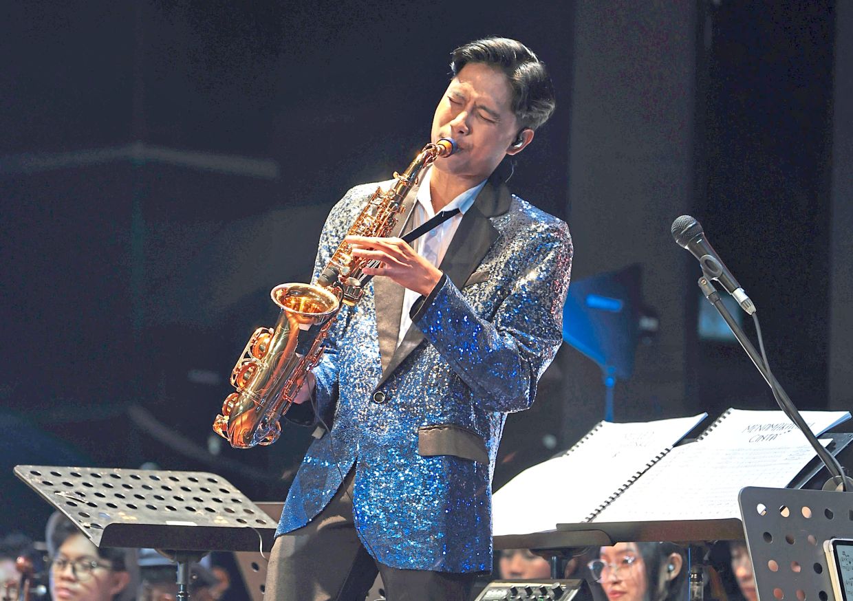 A performer rendering a jazzy tune on the saxophone.