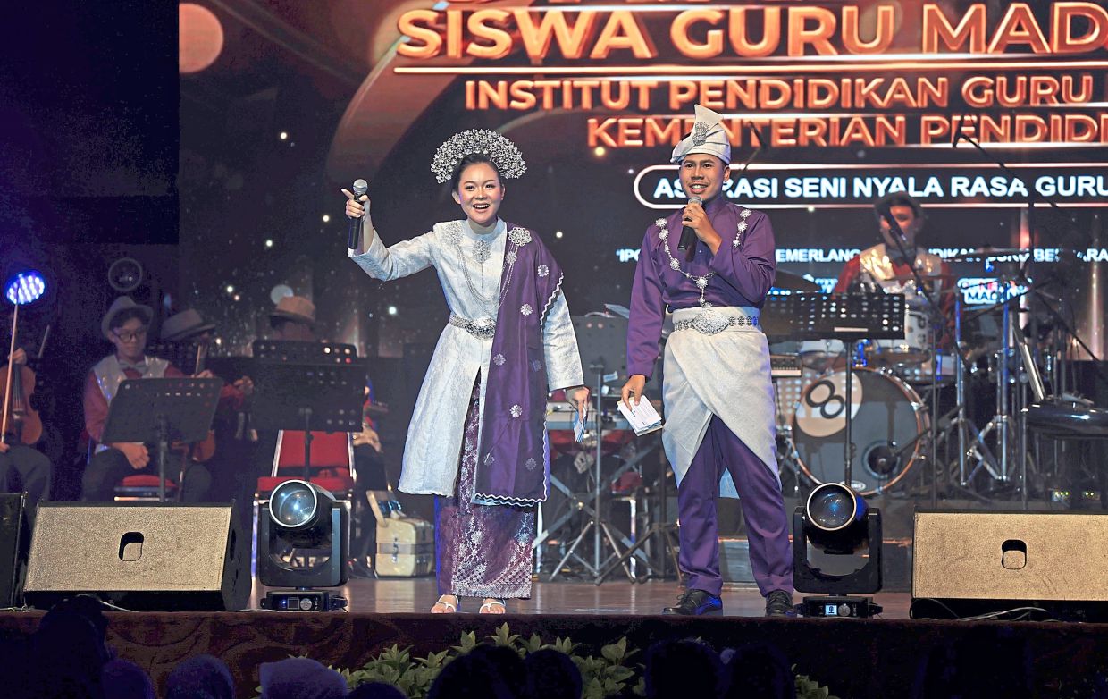 Performers delivering a Malay medley.