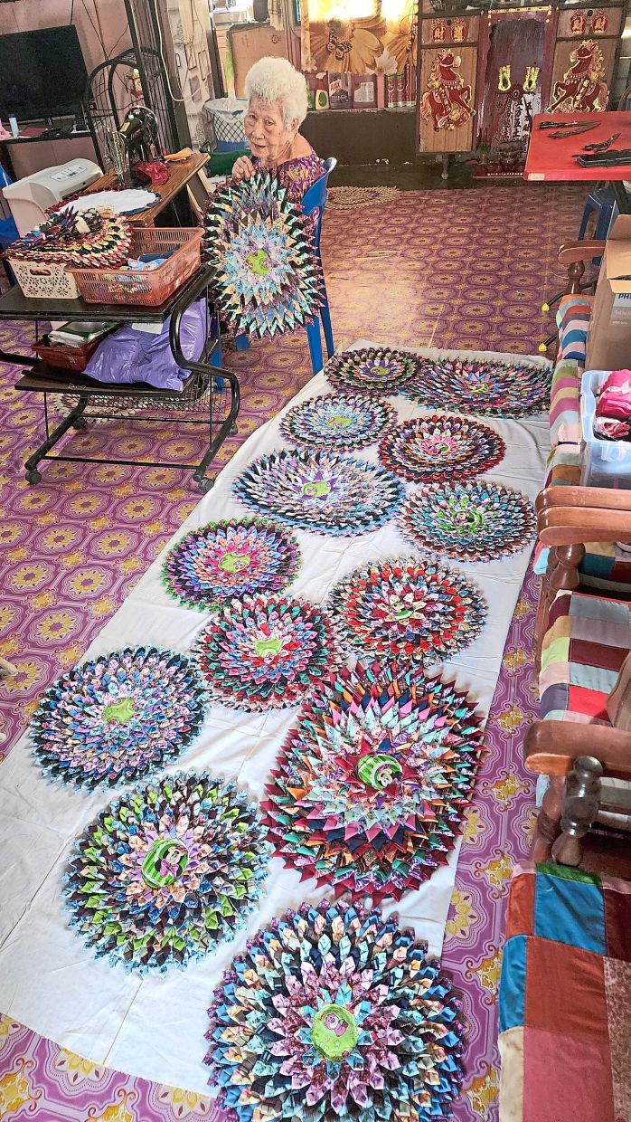 Cheong turns discarded fabric into colourful, practical floor mats. Photo: Thevi Elumalai