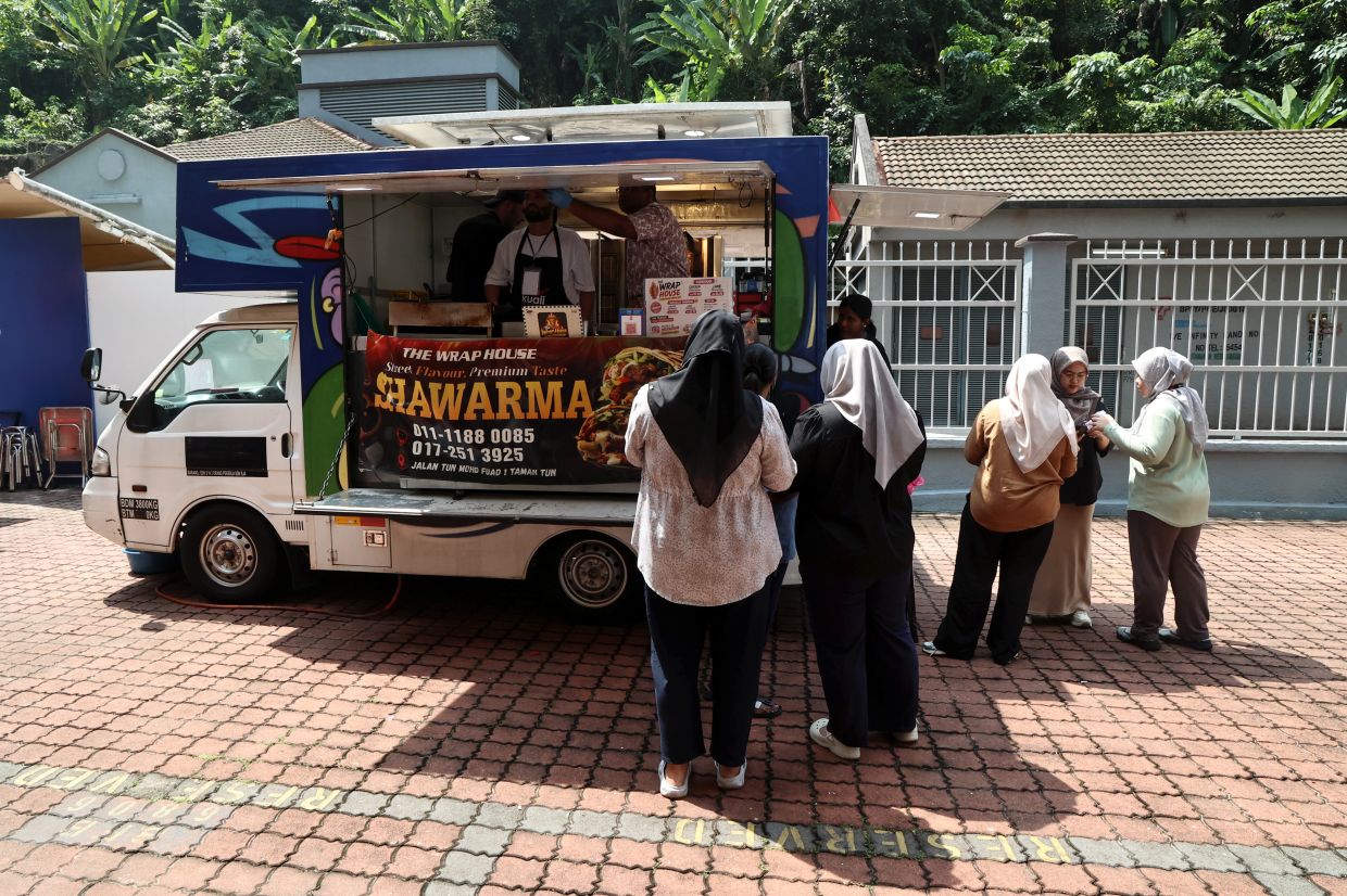 One of the vendors at the Bazaar Kopi ber-Kuali-ti event by Kuali X StarTrack at Menara Star. - Photo: AZMAN GHANI / The Star