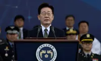 South Korea's Lee urges North Korea to restore dialogue, pledges military buildup