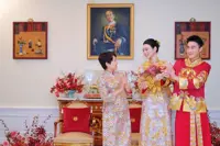 Mario Ho's mother gifts supermodel Ming Xi 22 gold bangles worth RM1.8mil at tea ceremony