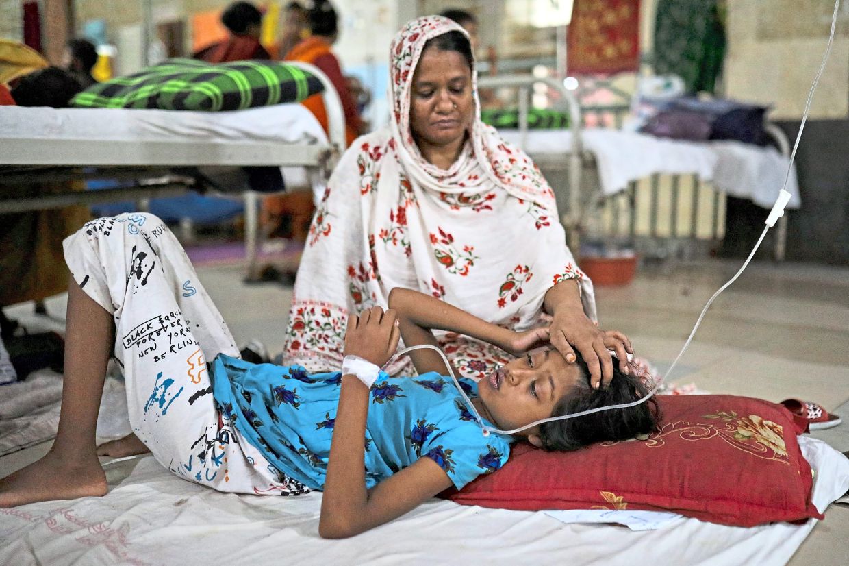 Dengue cases climb as rains persist