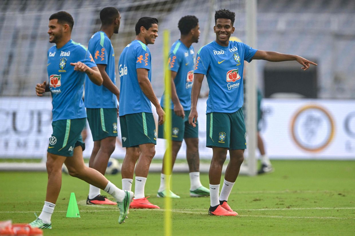 Brazil's Estevao Willian (right) and his teammates attend a training session on the eve of the international friendly exhibition football match between India and Brazil in Kolkata on Friday, October 2, 2026. -- Photo by Dibyangshu SARKAR / AFP