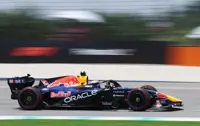 Motor racing-Verstappen sets pace in opening practice in Sepang