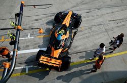 Motor racing-Norris blames Sepang tarmac as McLaren struggle in Bahrain GP qualifying