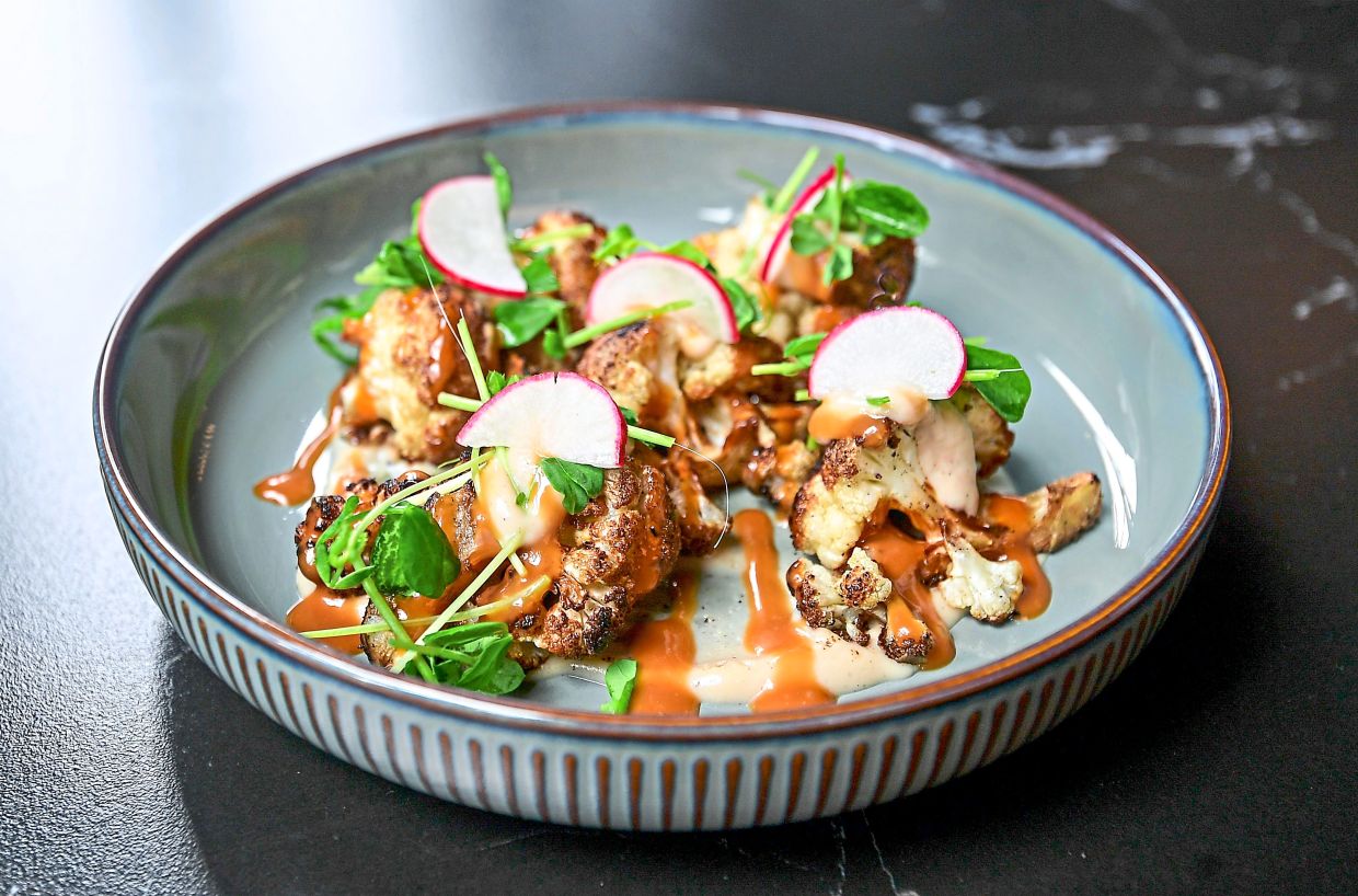 The humble cauliflower is turned into a smoky, seductive superstar in this offering.