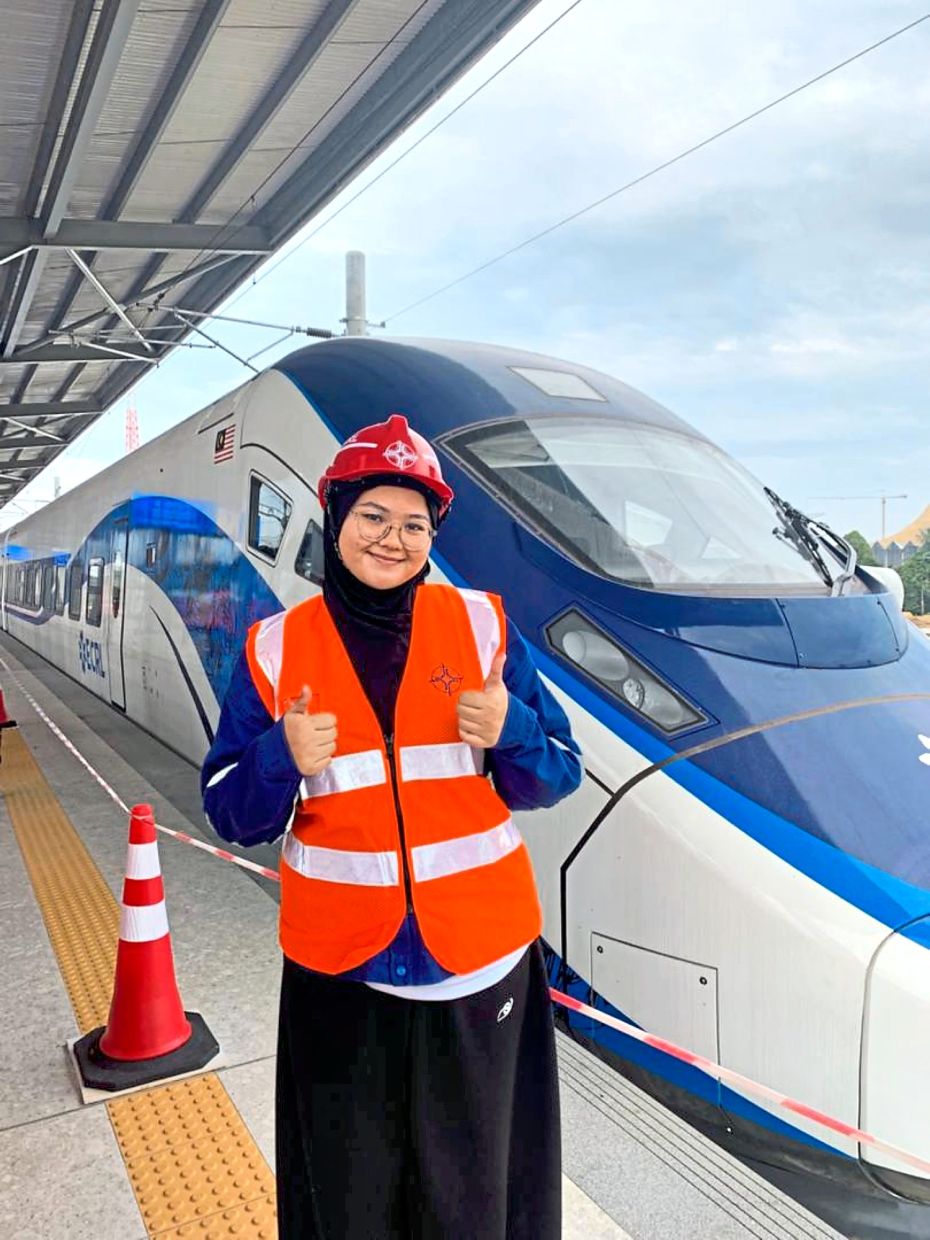 With ECRL’s Electric Multiple Unit (EMU) passenger train at KotaSAS Station in Kuantan, Pahang.