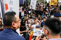 Taipei mayor defends city's inclusivity after gay bar raid sparks protests